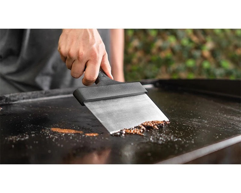 Scraping and preparing your griddle surface